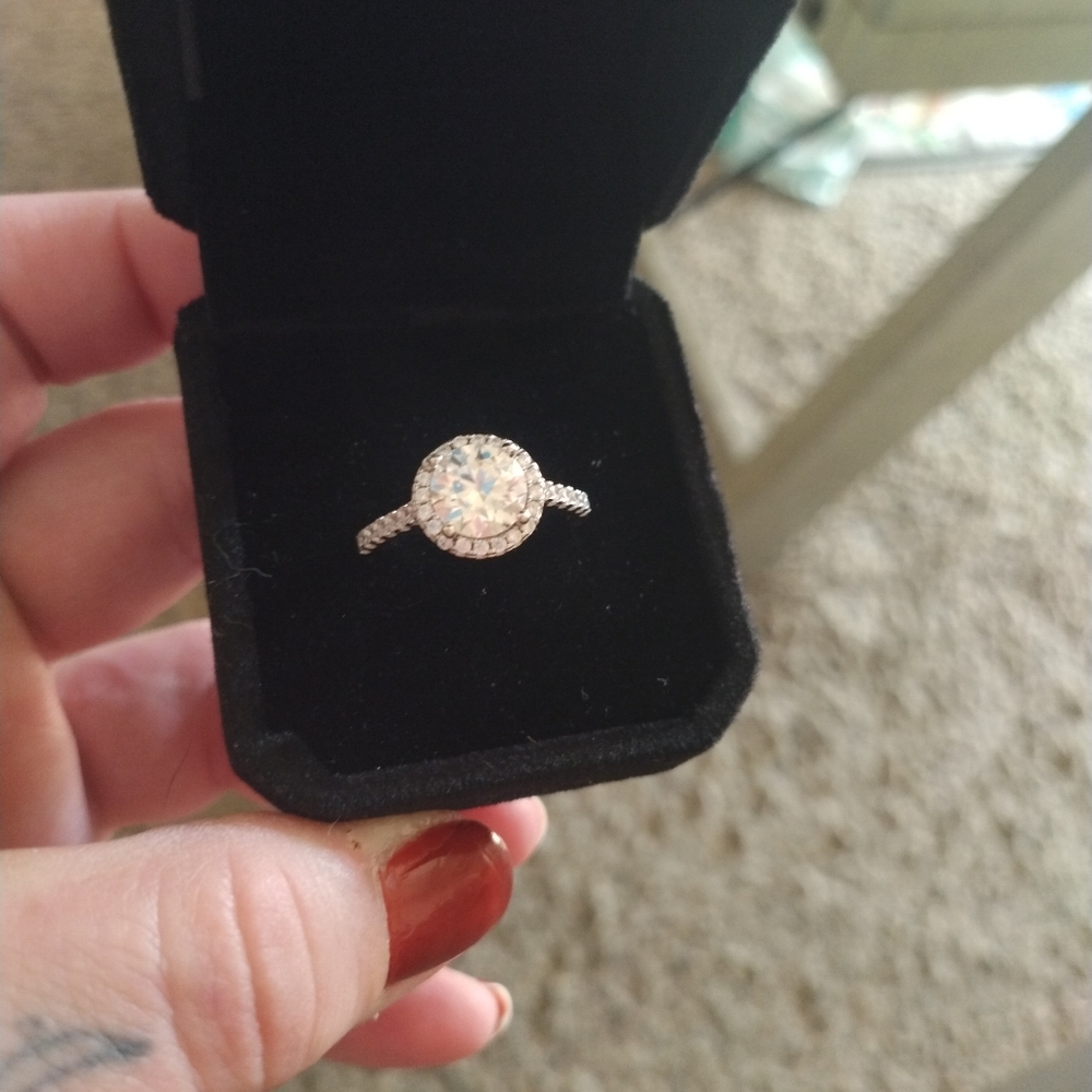Round moissanite engagement ring